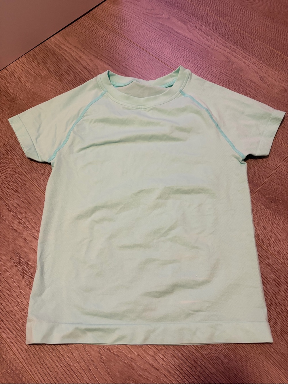 Women’s mint green athletic shirt Size L